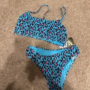 MOSMANN Australia “Stay Wild Havana” smocked bikini with a vibrant blue and pink